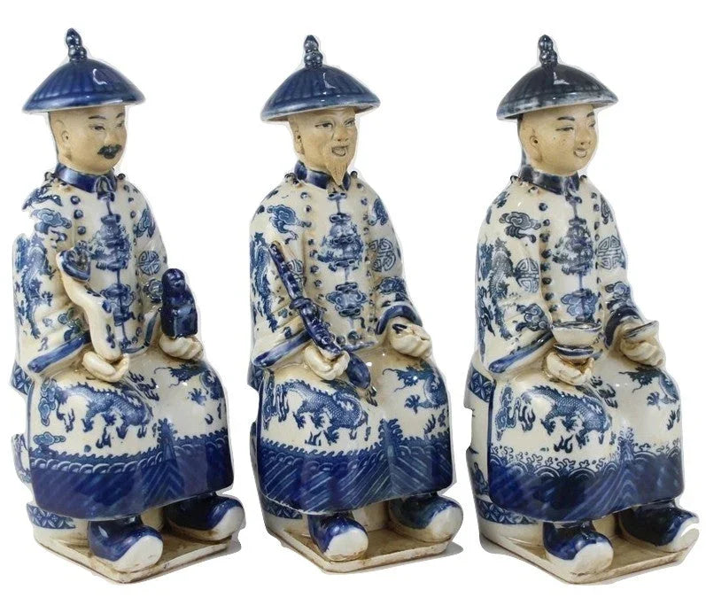 Trio d'empereurs assis en bleu et blanc